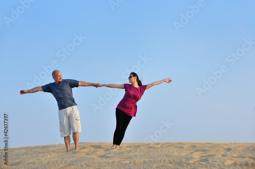 Photo: couple enjoying the sunset couple enjoying the sunset