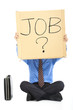 Businessman holding the  text looking for a job