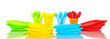 bright plastic disposable tableware isolated on white