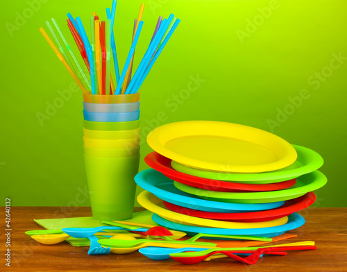 Photo: bright plastic disposable tableware bright plastic disposable tableware