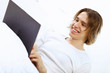 Photo: Young man with notebook Young man with notebook