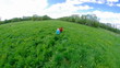 boy and small girl  on meadow with dandelion