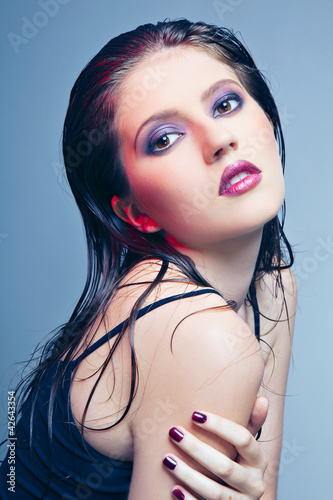 Photo: The perfect face of a woman with bright makeup The perfect face of a woman with bright makeup