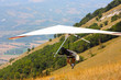 Hang glider pilot in Italian mountains