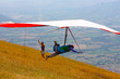 Hang glider pilot in Italian mountains