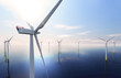 Offshore wind turbines in sunset on the ocean