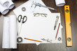 Photo: Tools and papers with sketches Tools and papers with sketches