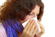 Young woman with flu virus