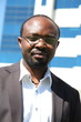 Foto: Young african businessman in bright sunny atmosphere Young african businessman in bright sunny atmosphere