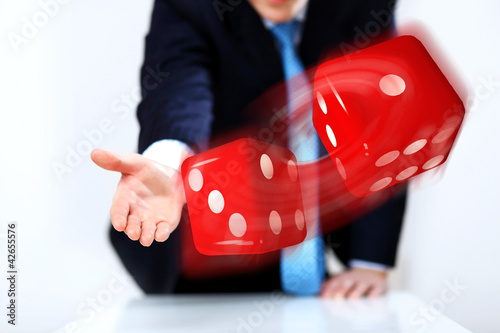 Photo: Flying dices as symbol of risk Flying dices as symbol of risk