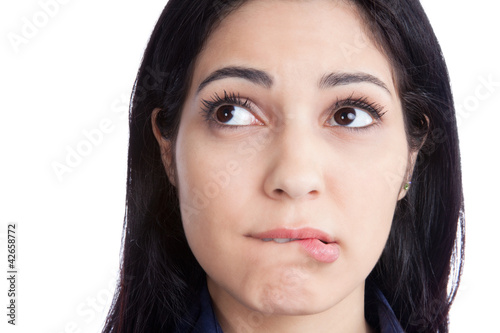 Photo: Happy Young Woman Biting Lips Happy Young Woman Biting Lips
