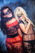 Photo: Dance happy young girls under masks on the party Dance happy young girls under masks on the party