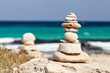 Photo: Balanced stones near the beach. Formentera island. Spain. Balanced stones near the beach. Formentera island. Spain.