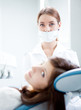 Photo: woman dentist working woman dentist working