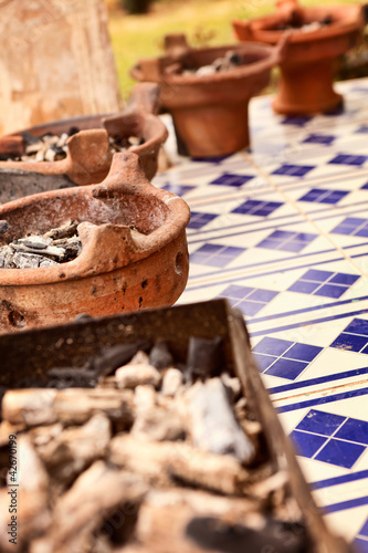 Photo: Embers prepared for cooking in tajine Embers prepared for cooking in tajine