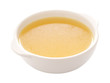 close up of a bowl of chicken broth