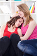 Photo: Teenager consoling her friend Teenager consoling her friend