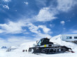 Snowcat in mountains