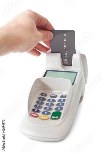Photo: Inserting credit card into bank terminal Inserting credit card into bank terminal