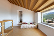 view of the room, rural home interior, small bed