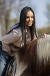 Girl riding on the horse