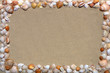 Sandy background with seashells frame