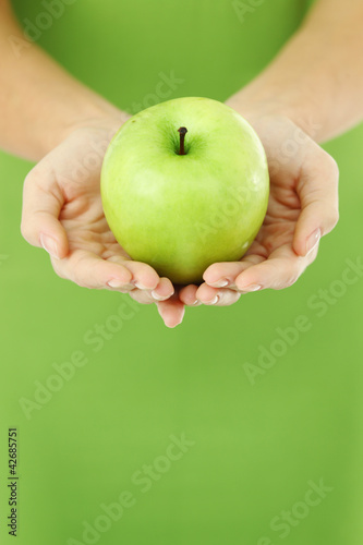 Photo: apple in hands apple in hands