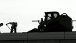 silhouette of construction workers