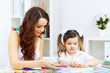 Foto: Mother and daughter studying Mother and daughter studying