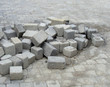 Photo: stack of cubic tile laying on pavement stack of cubic tile laying on pavement