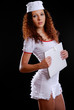 Photo: Pretty medical nurse with a folder Pretty medical nurse with a folder
