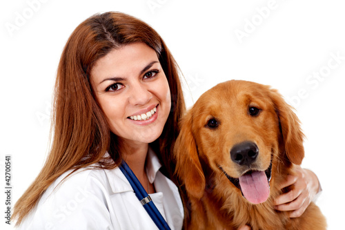 Photo: Female vet with a dog Female vet with a dog