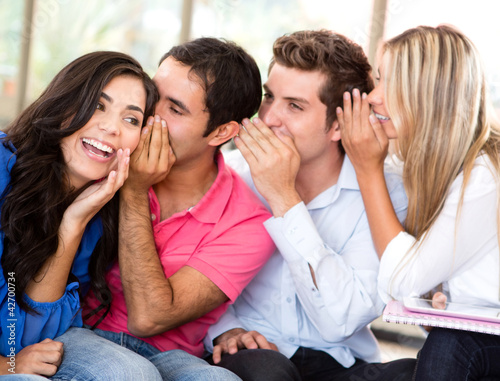 Photo: Students gossiping Students gossiping