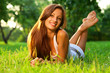 Pretty smiling girl relaxing outdoor
