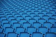 blue folding plastic seats at an outdoor event