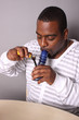 Medical marijuana user with a water pipe.