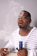 Medical marijuana user with a water pipe.