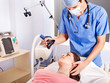 Patient wearing anesthesia mask at hospital.