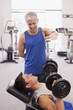 Men working out in gymnasium