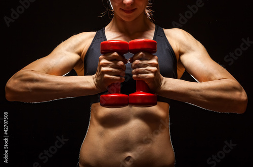 Photo: Girl with Dumbbell Girl with Dumbbell
