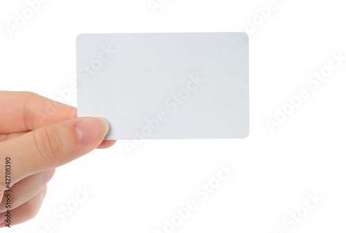 Photo: Hand holds business card on white background Hand holds business card on white background