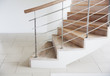 Wooden staircase and railing in modern house