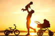 Photo: happy father with child on sunset happy father with child on sunset