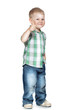 Photo: Portrait of beautiful little boy giving you thumbs up over white Portrait of beautiful little boy giving you thumbs up over white