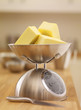 Cubes of butter on scale