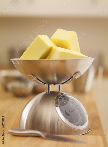 Photo: Cubes of butter on scale Cubes of butter on scale