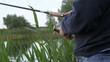 Video: A man catches a fish. Fishing A man catches a fish. Fishing