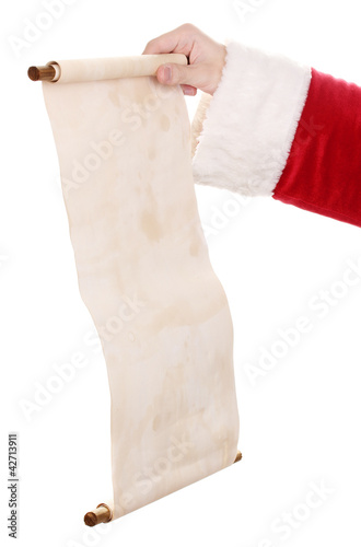 Photo: Santa Claus hand holding list on white Santa Claus hand holding list on white