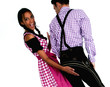 Photo: Fröhliches Bayerisches Paar mit Lederhosen und Dirndl Fröhliches Bayerisches Paar mit Lederhosen und Dirndl