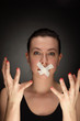beauty girl with tape on lips
